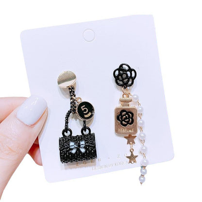 Asymmetrical small fragrance flower earrings